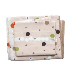 Juego de sábanas estampado beige con círculos